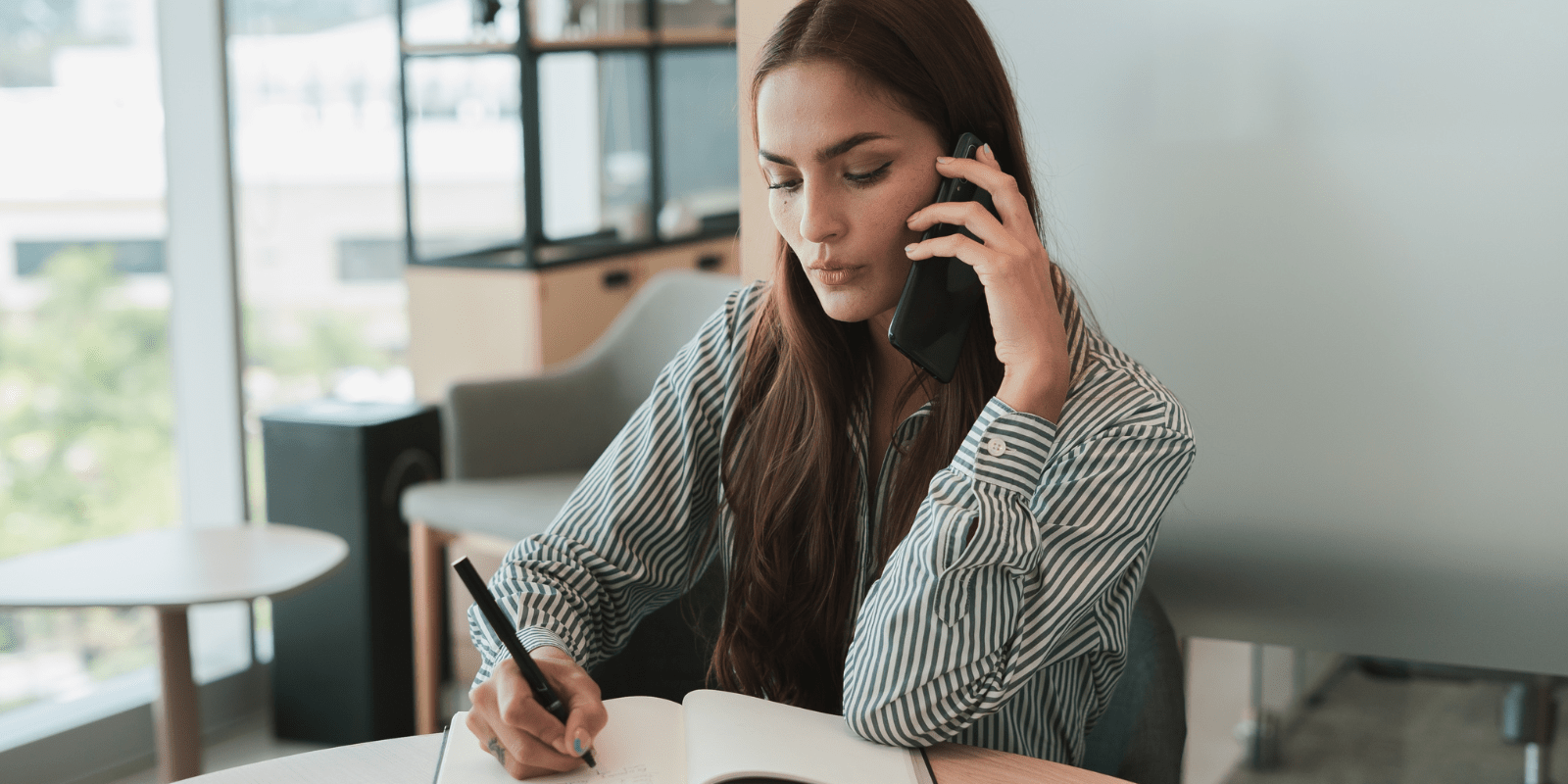 woman on phone representing a bpd coaching call